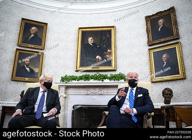 United States President Joe Biden meets with Prime Minister Boris Johnson of Britain in the Oval Office of the White House in Washington, DC, on Tuesday