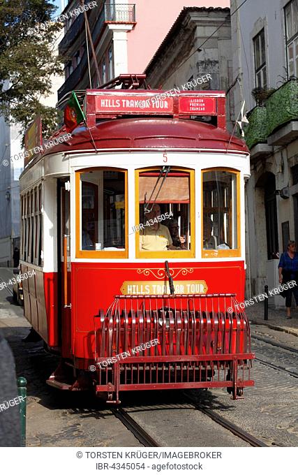 Old tram in the Alfama district, Lisbon, Portugal