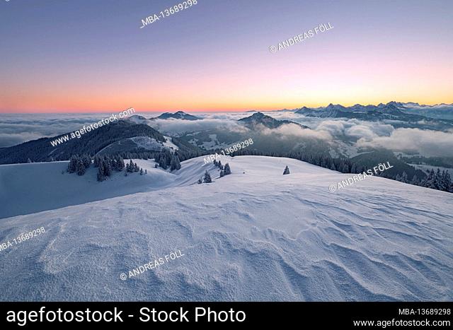 Alpine mountain landscape at dawn on a cold winter day. View from Wertacher Hörnle to the Allgäu Alps. Bavaria, Germany, Europe