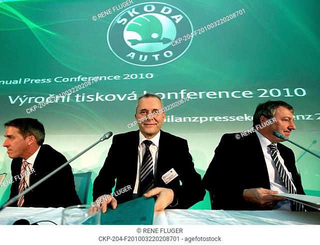 From left to right board mebers of car maker Skoda Auto Holger Kintscher, Reinhard Jung and Klaus Dierkes are seen after the company's annual press conference...