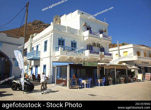 View to the whitewashed houses with balconies and traditional restaurants at the port village Katapola, Amorgos Island, Cyclades Islands, Greek Islands, Greece