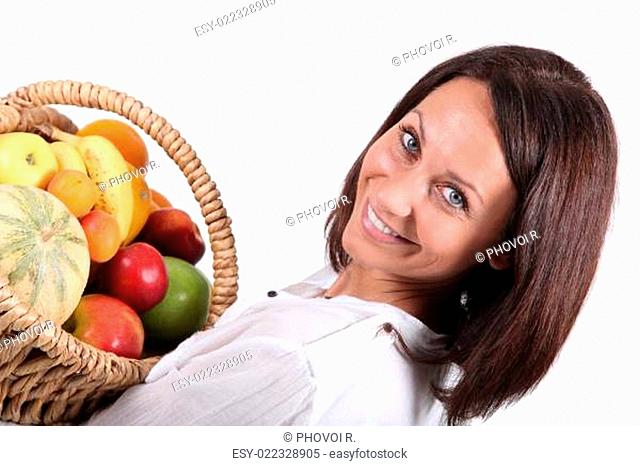 woman holding a fruits basket