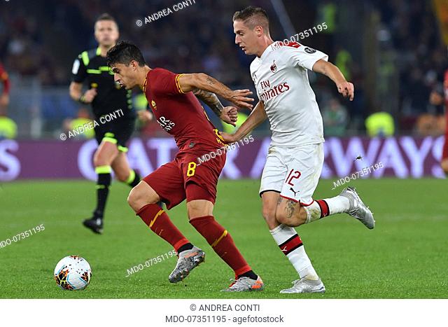 Roma football player Diego Perotti and Milan football player Andrea Conti during the match Roma-Milan in the Olimpic stadium