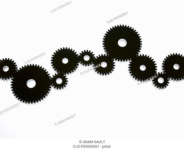 Group of cogs in line