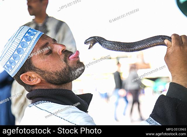 Snake charmer in Jemaa el-Fna square marrakesh