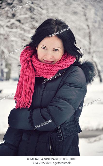 Smiling mid adult woman portrait, winter