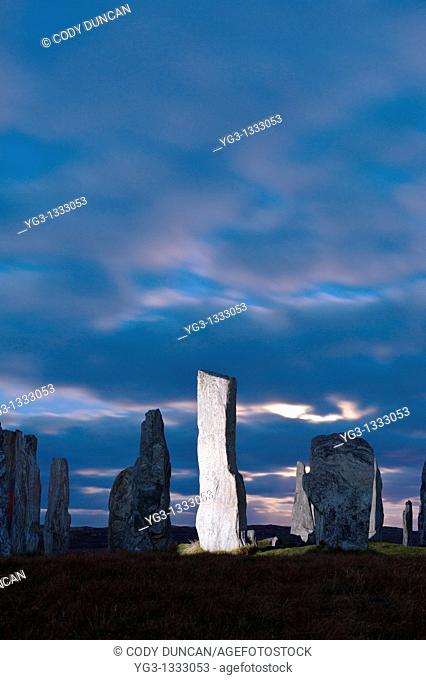 Callanish standing stones illuminated by light at night, Isle of Lewis, Outer Hebrides, Scotland