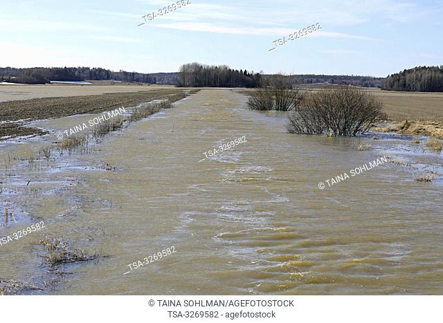 Tuohittu, Salo, Finland. March 24, 2019. Spring flooding of Muurlanjoki river onto fields in Tuohittu, Southwest of Finland