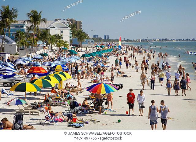 Sunbathers on Fort Myers Beach on the Gulf of Mexico in Southwestern Florida