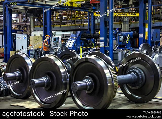 RUSSIA, SVERDLOVSK REGION - DECEMBER 19, 2023: Assembling Lastochka ES104 high-speed electric train wheelsets at the Ural Locomotives plant in the town of...