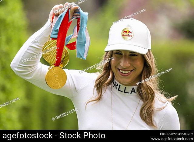 Czech skier and snowboarder Ester Ledecka poses with medals after press conference in Prague, Czech Republic, April 25, 2022