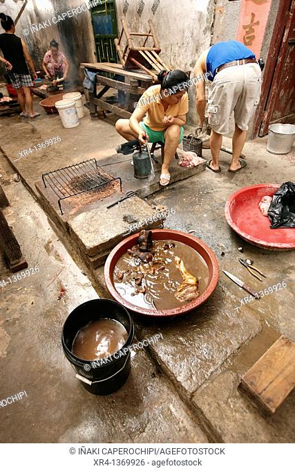 Preparing food, Market Rongjiang, Rongjiang, Guizhou, China