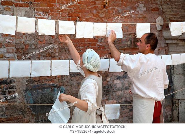Paper making, historical reenactment at Venice Arsenale, Venice, Italy, Europe