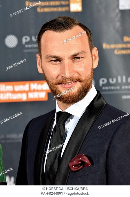 Actor Johnny Palmiero poses on the red carpet at the premiere of the action film 'Collide' in Cologne,  Germany, 01 August 2016