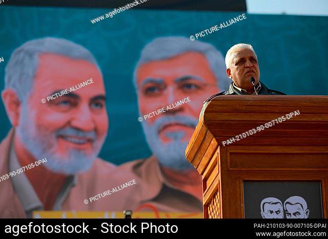 03 January 2021, Iraq, Baghdad: Chairman of the Popular Mobilization Forces Falih Al-Fayyadh speaks during a protest at Tahrir Square to commemorate the...