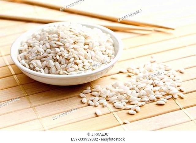 the uncooked arborio rice in bowl