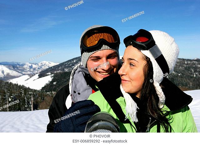 Young couple on a ski slope