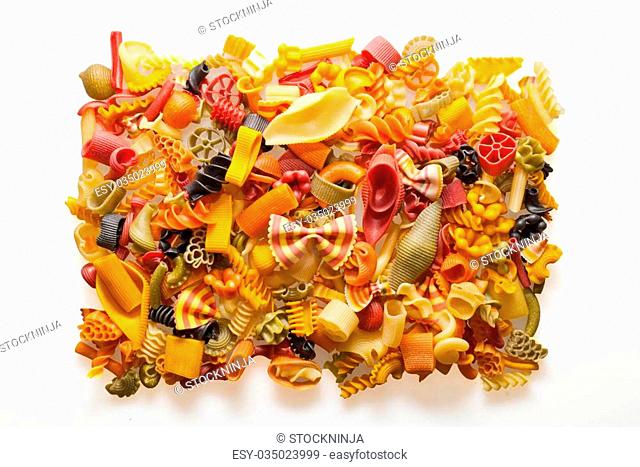 Colourful pasta mix isolated on white background
