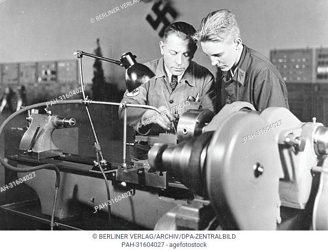 An apprentice of Ernst Heinkel Flugzeugwerke (Ernst Heinkel Aircraft Manufacturer) is pictured with..., Stock Photo, Picture And Rights Managed Image. Pic. PAH-31604027 | agefotostock