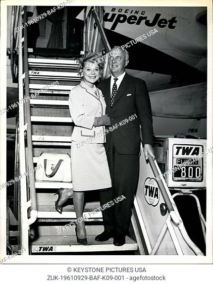 Sep. 29, 1961 - New York International Airport: Former Olympic Ice Skating Champion Sonja Henie and her husband Niels Onstad are shown prior to boarding a TWA...