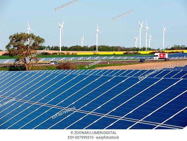 Rape field, solar modules, wind turbines