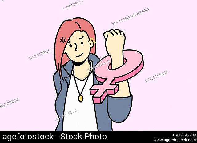 Young female feminist with female symbol on fist stand for feminism and women rights. Concept of international day of elimination of violence against woman