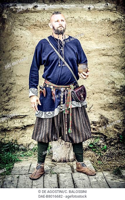 Man wearing Rus trousers, Festival of Slavs and Vikings, Centre of Slavs and Vikings, Jomsborg-Vineta, Wolin island, Poland
