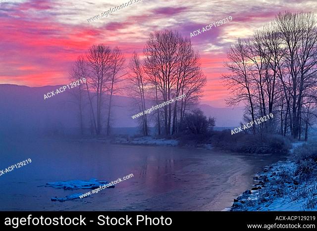 Red dawn sunrise, Alouette River, Pitt Meadows, British Columbia, Canada