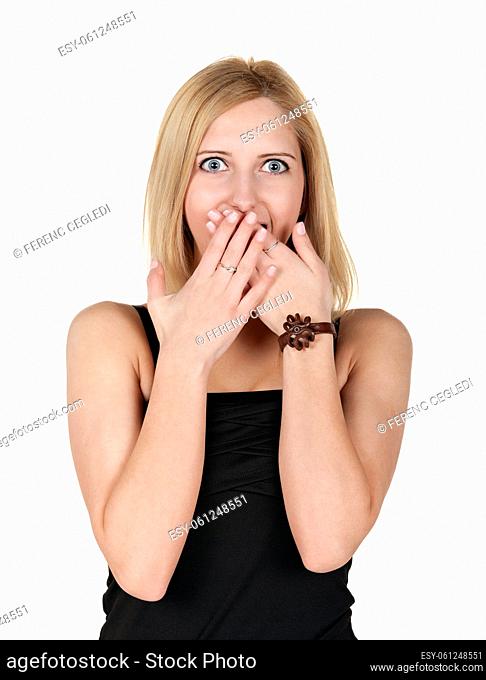 Portrait of an amazed young (19) girl over white background
