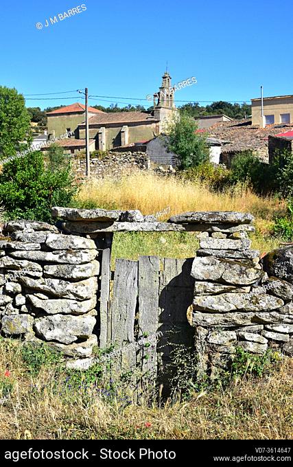 Fornillos de Fermoselle, Villar del Buey municipality. Door and church. Zamora province, Castilla y Leon, Spain