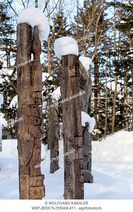 View of a carved wooden Ainu poles in Ainu Kotan, which is a small Ainu village in Akankohan in Akan National Park, Hokkaido, Japan