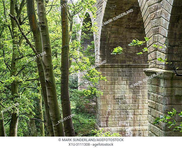 Railway viaduct on the disused part of the old Leeds and Thirsk Railway in the Crimple Valley Harrogate North Yorkshire England