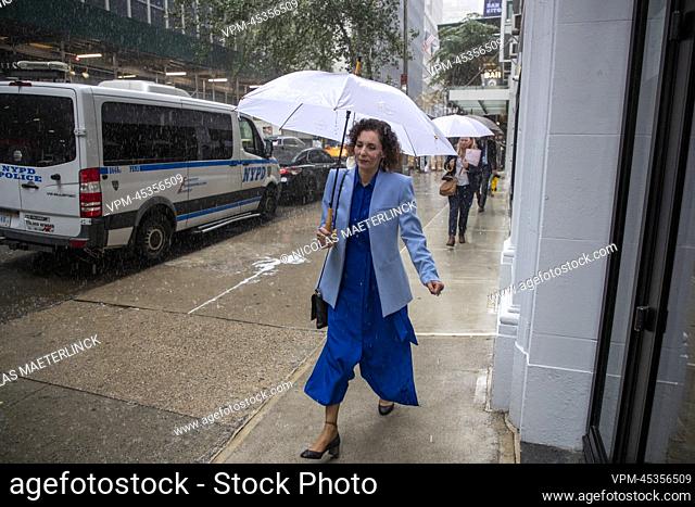 Foreign minister Hadja Lahbib pictured walking with an umbrella in the streets of New York City during the 77th session of the United Nations General Assembly...