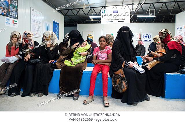 Women and children wait in the infirmary of the refugee camp in Zaatari, Jordan, 22 September 2015. The camp run by the United Nations High Commissioner for...