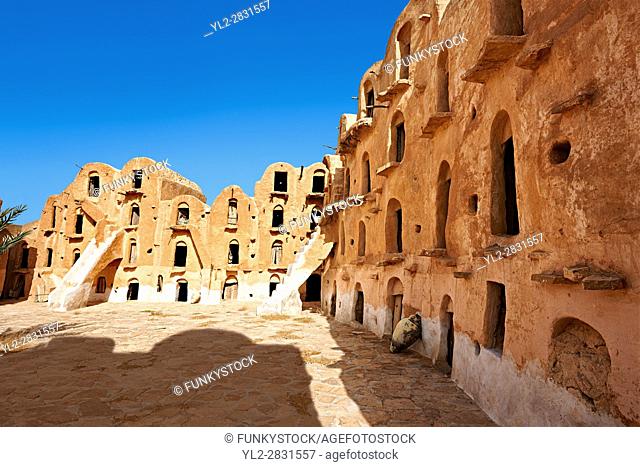Ksar Ouled Soltane, a traditional Berber and Arab fortified adobe vaulted granary cellars, or ghorfas, situated on the edge of the northern Sahara in the...