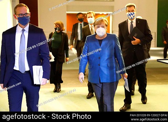 28 October 2020, Berlin: Federal Chancellor Angela Merkel (CDU, M) will attend a press conference at the Federal Chancellery after meeting with the prime...