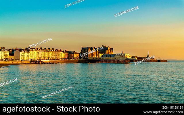 Aberystwyth, Ceredigion, Wales, UK - May 25, 2017: Evening view over the beach, the pier and the old University College