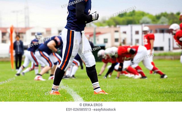 American football player on the field prepared for action