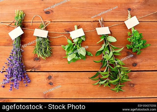 greens, spices or medicinal herbs on wood