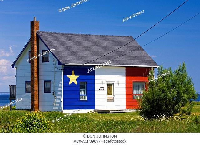 House with Acadian flag, Grand Anse, New Brunswick, Canada