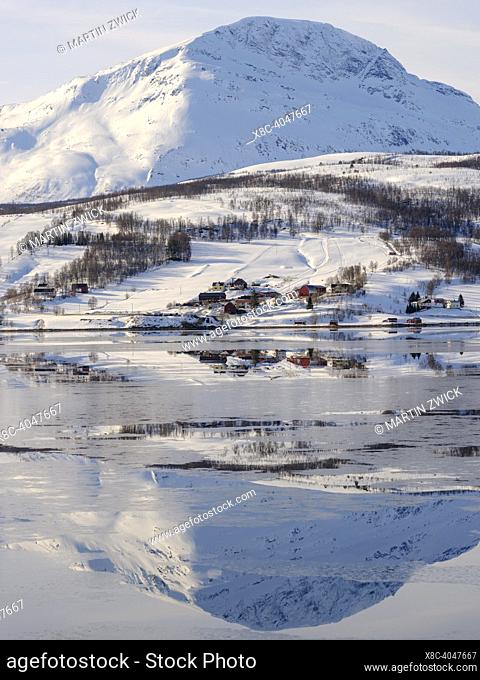 Landscape at Lavangen Fjord and the hamlet of Rokenes during Winter. Europe, northern europe, Norway