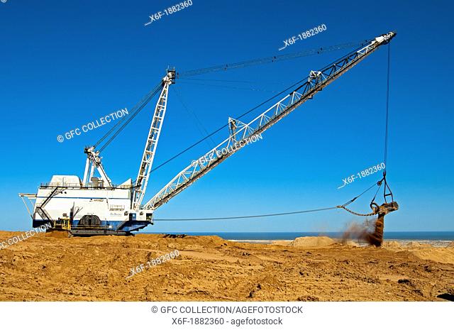 Dragline excavator handling overburden at the De Beers diamond mine Kleinzee, Northern Cape province, South Africa