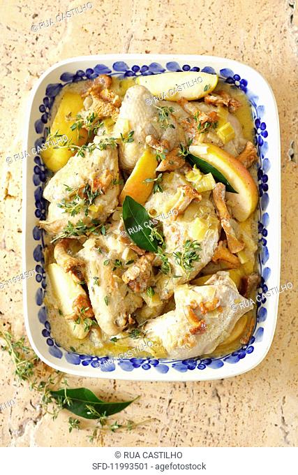 Chicken braised with leeks, apples and chanterelle mushrooms