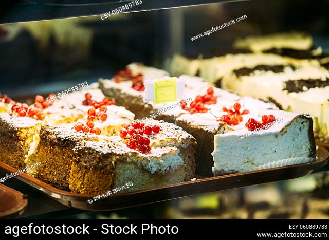 Fresh Sweet Cakes In Pastry Shop Glass Display