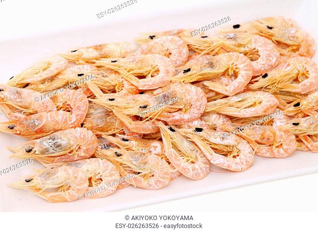 dried shrimp on plate isolated on white background