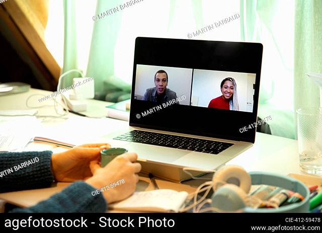 Business people video chatting from home on laptop screen