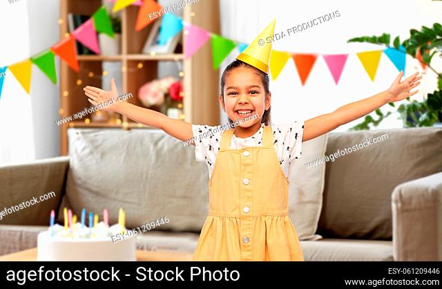 happy little girl at birthday party at home