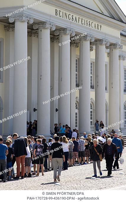 Visitors wait for admission in front of the Fridericianum in Kassel, Germany, 23 July 2017. Already falf of the time of the arts exhibition documenta 14 has...