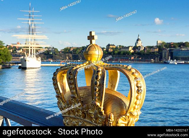 Sweden, Stockholm, old town, Skeppsholmbron, gilded crown, in the background AF Chapman