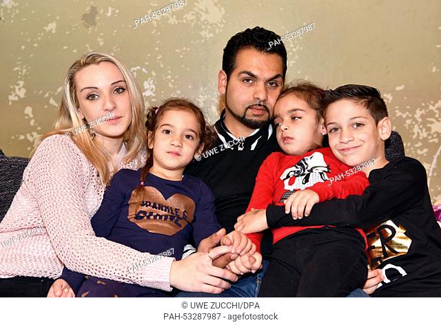 Sick Aliana (4-L) sits with her family, mother Mirella Kunzmann, sister Amelia, father Suvarez Iljaz and Bruder Nedzat in Bad Hersefeld, Germany